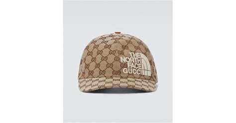 cappello gucci north face